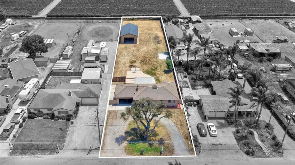 Aerial drone view of 664 Middlefield Rd showing the home, detached workshop, and expansive lot.